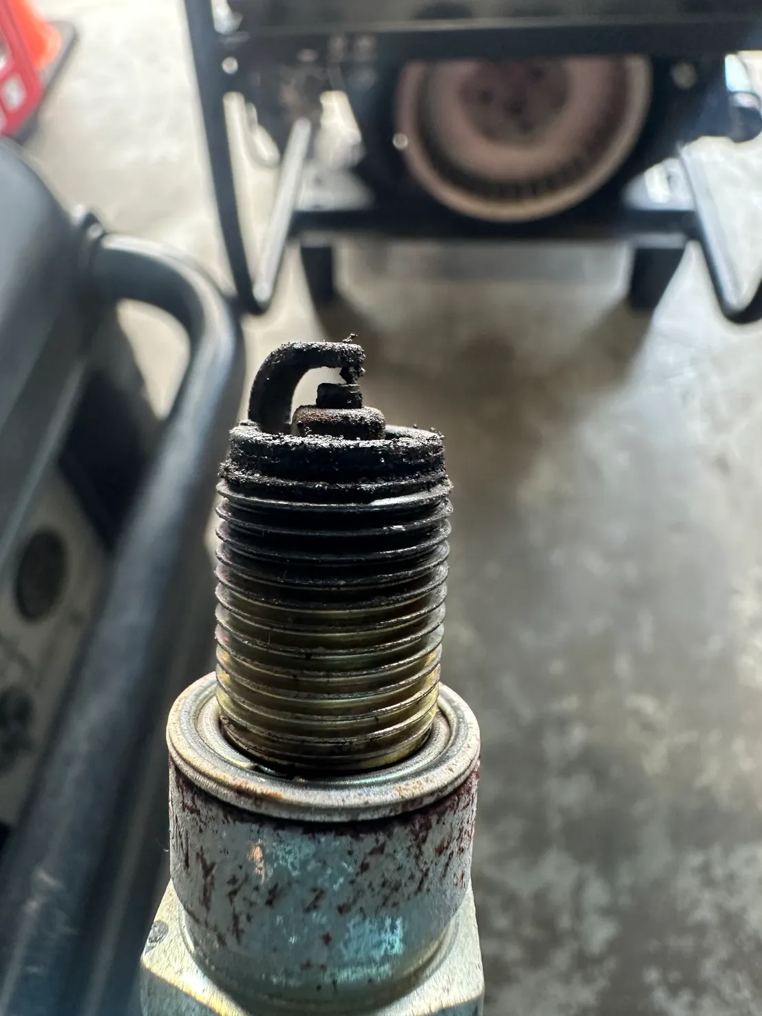 Fouled spark plug replacement