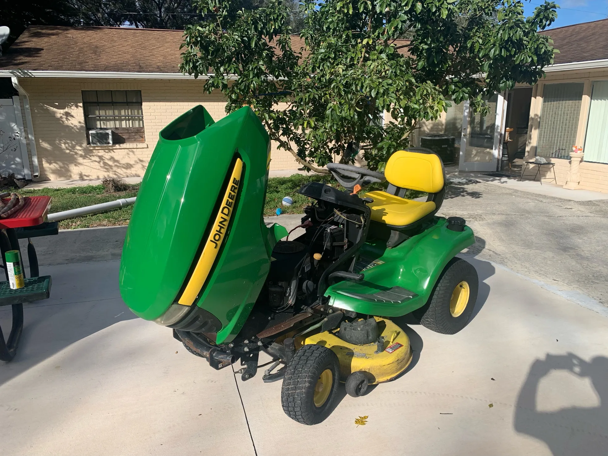 Riding mower engine inspection