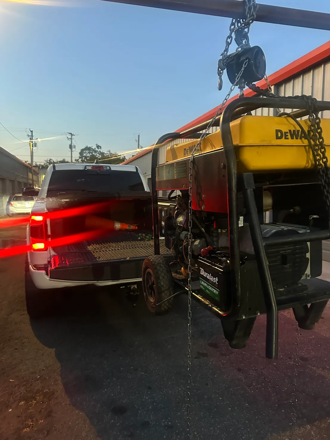Equipment pickup by trailer